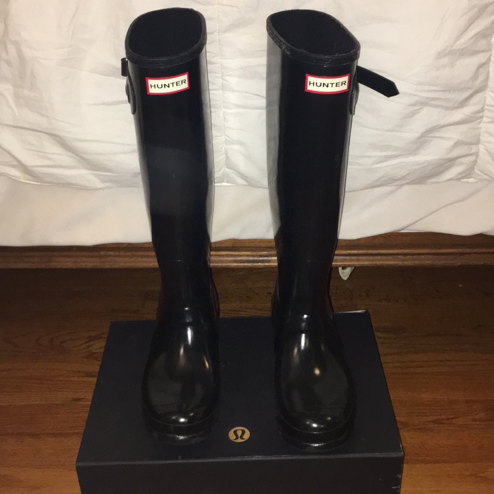 Glossy black hunter boots